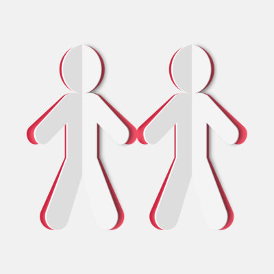 Love Paper styled cutout of two people, similar to a paper family chain, the central fold in each shape raises the edges of each silhouette to reveal a red background.